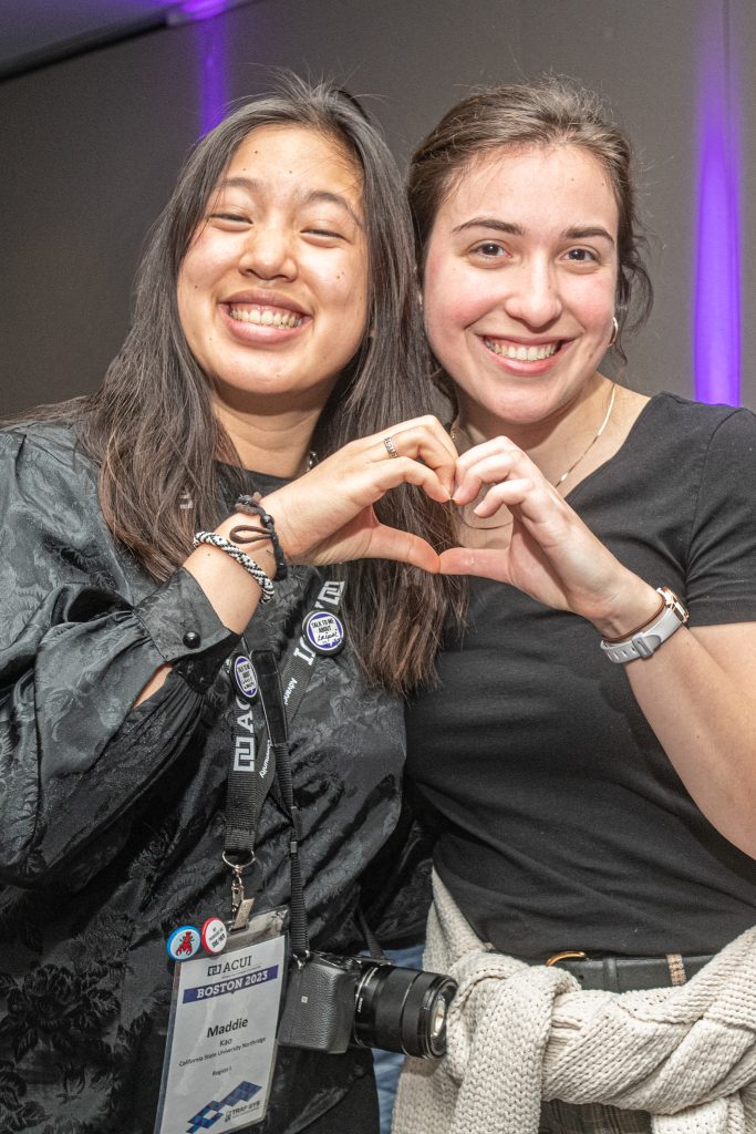 ACUI members happily looking at camera